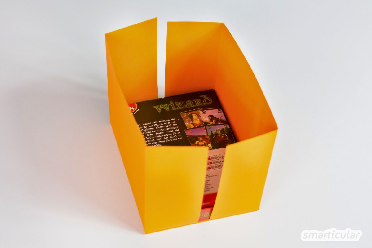 Gegenstand einlegen und die Oberseiten flach umklappen