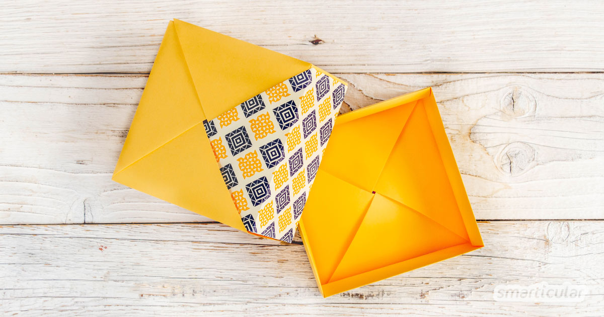 Statt Geschenkpapier oder eine Schachtel mit Deckel zu kaufen, kannst du aus (Alt-)Papier eine Origami-Box ganz einfach selber falten.