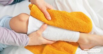 Essigwickel sind leicht anzuwenden und wirken als natürlicher Fiebersenker. Erfahre, wie es funktioniert und was Du vermeiden solltest.